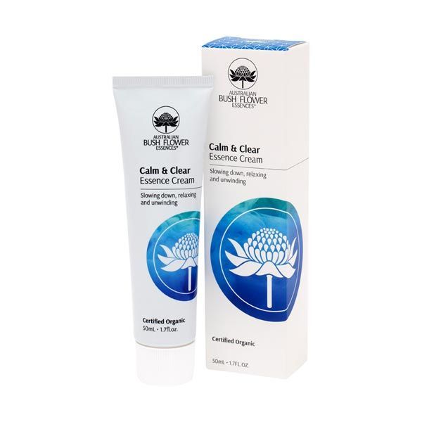  A tube and box of "Australian Bush Flower Essences Calm & Clear Essence Cream", each displaying blue watercolour flower designs and certified organic labels. The 50ml packaging emphasizes relaxation and is set against a white background.