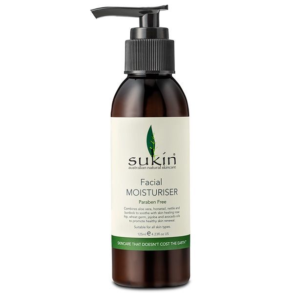  A 125ml brown bottle with a pump dispenser of "Sukin Australian Natural Skincare Facial Moisturiser". The label is cream-coloured and notes the product is paraben-free and suitable for all skin types, set against a white background.